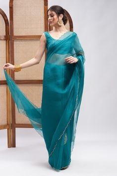 Turquoise pure silk organza saree with placement tree motifs, contrast resham and sequin embroidery. Comes with unstitched blouse piece. - Aza Fashions Fitted Organza Blouse Piece With Zari Work, Anarkali Style Pre-draped Organza Saree For Eid, Fitted Anarkali Blouse Piece In Organza, Fitted Anarkali Organza Blouse Piece, Designer Pre-draped Organza Saree For Eid, Fitted Organza Anarkali Blouse Piece, Designer Wear Organza Blouse Piece For Transitional Season, Transitional Organza Blouse Piece For Designer Wear, Fitted Organza Blouse Piece For Diwali