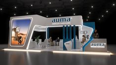 an exhibition stand with people standing around it