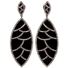 These earrings are cast in 18K gold and sterling silver. It is hand set in 60.25 carat black onyx and 4.45 carat of sparkling diamonds. Complimentary conversion to clip-on earrings is available. FOLLOW MEGHNA JEWELS storefront to view the latest collection & exclusive pieces. Meghna Jewels is proudly rated as a Top Seller on 1stDibs with 5 star customer reviews. All items manufactured by us are handmade and can be customized or redesigned. Marquise Earrings, Teardrop Diamond, Diamond Jewelry Earrings, Black Onyx Earrings, Fine Gold Jewelry, Semi Precious Gems, Onyx Earrings, Diamond Drop Earrings, Wedding Jewelry Earrings