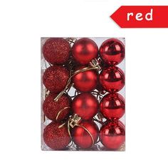 red christmas ornaments in a clear box with a red sign above it that says red