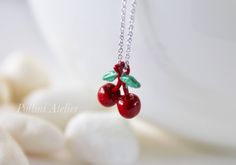 cherry necklace in lipstick red. gold/ silver chain sweet...I love you cherry much :) ♥ pendant size: 15x12mm ♥ total length: around 16 inches + 2 inch extender ♥ metal : gold/ silver plated ♥ lobster clasp ♥ To view more simple and modern necklaces, please go to https://www.etsy.com/shop/PolliniAtelier?section_id=7162802&ref=shopsection_leftnav_3 ♥ Please take note of the sizes and dimensions as they may appear larger or smaller from photos on certain monitors/computers. ♥ Thanks for stoppi Sweet Red Jewelry For Valentine's Day, Cute Handmade Red Charm Necklaces, Cute Handmade Red Charm Necklace, Cute Red Handmade Charm Necklace, Cute Cherry-colored Jewelry For Gifts, Cute Cherry-colored Jewelry Gift, Red Cherry Print Jewelry For Gifts, Trendy Red Charm Necklaces For Gifts, Cute Red Charm Necklace For Gift