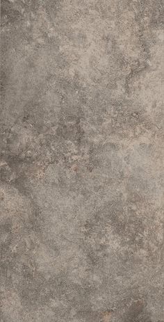 an old grungy concrete wall textured with light brown and dark gray paint