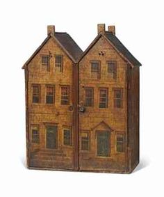 two wooden dolls houses with windows and doors on each side, one has a door open to the other