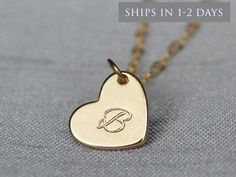 "This beautiful and personalized gold heart necklace would be a perfect graduation present or a gift for any loved one! The gold plated heart charm measures approximately 21x16mm (including jump ring) and is hung on a 16\", 18\" or 20\" gold plated or 14k gold filled chain. The chains are dainty and very pretty - the perfect delicate necklace for everyday wear. You can also add multiple hearts to the necklace. This sweet necklace is sure to be one of the recipient's favorite pieces of jewelry! I Heart Charm Necklace For Best Friend, Personalized Heart Pendant Charm Necklace For Best Friend, Valentine's Day Initial Pendant Necklace For Best Friend, Valentine's Day Best Friend Gift Initial Pendant Necklace, Custom Name Gold Heart Necklace, Gold Heart Pendant Necklace For Best Friend, Heart-shaped Gold Necklace For Best Friend, Heart-shaped Engraved Charm Necklace For Best Friend, Customizable Heart-shaped Necklace For Best Friend