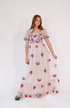 + neutral tan with colorful hand-finished floral embroidery+ subtle tulle puff sleeves+ maxi length with sweetheart neckline * Runs small, size up, if in between Spring Floral Embroidered Maxi Dress For Prom, Spring Prom Maxi Dress With Floral Embroidery, Summer Floral Embroidery Maxi Dress For Prom, Floral Embroidered Maxi Dress For Summer Prom, Floral Embellished Maxi Dress For Spring Prom, Floral Embroidery Maxi Dress For Summer Prom, Embroidered Maxi Dress For Prom, Prom Embroidered Maxi Dress, Prom Maxi Dress With Embroidery