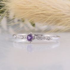 14k solid white gold dainty & small purple amethyst promise ring for her,Delicate minimalist vintage style art deco amethyst engagement ring WE OFFER UNLIMITED PERIOD INSTALLMENTS PLAN This is a beautiful, stunning, feminine ring that works well for all occasions, styles, and ages. You will love it! Ring information: Main stone: Amethyst Approximate size: 2.5mm Accent stones: White cubic zirconia Approximate size: 1.25mm (4 stones) Metal type: Gold Metal stamp: 14k Gold Installment Payments Promise Rings Amethyst, Amethyst Promise Rings, Elegant Lavender Amethyst Ring In 14k Gold, Dainty White Gold Jewelry With Bezel Setting, Elegant Amethyst Ring With Diamond Accents, Elegant Purple Jewelry With Diamond Accents, Elegant Amethyst Ring With Cubic Zirconia And Prong Setting, Elegant Amethyst Birthstone Ring In Round Band, Elegant Amethyst Birthstone Ring Round Band