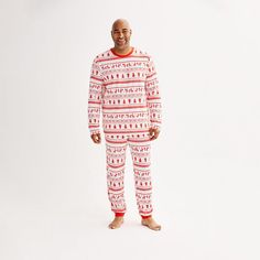 Your candy cane crew will look sweet dressed in the festive fairisle of these Jammies For Your Families family pajamas.Your candy cane crew will look sweet dressed in the festive fairisle of these Jammies For Your Families family pajamas.FEATURES 2-piece set includes: top & bottomsCozy jersey construction Crewneck Long sleevesFIT & SIZING 30-in. inseam Elastic waistband Loose fitFABRIC & CARE Polyester, spandex Machine wash Imported Size: L Tall. Color: Candy Cane Fairisle. Gender: male. Age Gro Color Candy, Cuddl Duds, Family Pajamas, Pajama Bottoms, Sweet Dress, Pajama Top, Big & Tall, Fair Isle, Candy Cane