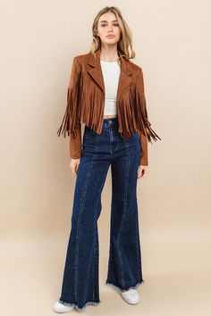 Elevate your style with our Fringed Suede Jacket! Made from high-quality suede, this jacket features beautiful fringe detailing that adds a touch of bohemian flair to any outfit. Stay warm and fashionable in this must-have piece. Perfect for any occasion, this jacket is a versatile addition to your wardrobe. This jacket is a true to size fit, this top does not have much stretch, so this is true to size. Model Info: Height: 5'6 Weight: 130lbs Bust: 34D Shoe Size: 8 Bottom: 7 (M) Top: M Product De European Winter Fashion, Fringe Jacket Outfit, European Fashion Winter, Suede Jacket Outfit, European Winter, Timeless Looks, Summer Packing, Suede Fringe Jacket, Winter Event