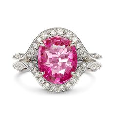 Gracefully choreographed in perfect harmony with the center stone, the Diana Vincent Duet Ring combines sophisticated styling with timeless appeal. - Platinum - Oval Madagascar pink sapphire - 5.11 carats sapphire weight - .97 carat total diamond weight - 16mm wide Pink Sapphire Diamond Ring, Pink Jewels, Colored Stone Rings, Wedding Rings Round, Bow Ring, Pink Sapphire Ring, Sapphire Diamond Ring, Pink Jewelry, Alternative Engagement Rings