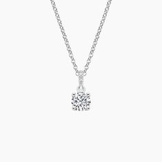 a diamond pendant on a chain