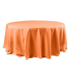 an orange table cloth on top of a round table