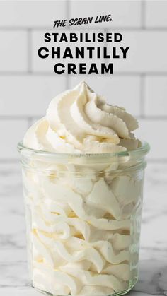 a glass jar filled with whipped cream