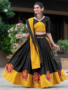 Elevate your traditional attire with this stunning black & yellow gamthi work cotton Navratri lehenga choli. This fully stitched ensemble features intricate gamthi and mirror work on the lehenga, colorful cowrie lace touch-up on the choli, and gamthi work on the plain dupatta with a lace border. The vibrant colors and traditional designs make it the perfect outfit for the Navratri festival.
This gorgeous lehenga choli includes a 5-meter flair for graceful movement, a lehenga length of 42 inc Gamthi Work, Navratri Lehenga, Lehenga Crop Top, Mirror Work Lehenga, Cotton Lehenga, Alaska Fashion, Lehenga Choli Wedding, Navratri Chaniya Choli, Party Wear Lehenga Choli