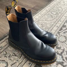 Never Worn! Size 7. Great Condition Black Chelsea Boots With Leather Footbed For Work, Black Chelsea Boots With Leather Lining, Classic Black Boots With Cushioned Footbed, Casual Black Chelsea Boots With Leather Footbed, Black Slip-on Boots With Leather Lining, Black Leather-lined Slip-on Boots, Black Slip-on Chelsea Boots With Leather Footbed, Black Chelsea Boots For Work, Dr Martens Chelsea