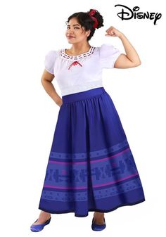 a woman in a blue skirt and white shirt posing for the camera with her hand on her hip