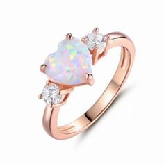 Pink Simulated Opal Cubic Zirconia Heart Ring Rose-Gold Plated Sterling Silver Size 7. Our Silver Jewelry Is Made From Sterling Silver. Sterling Silver Is A Mixture Of High-Quality 92.5% Or Higher Pure Silver With Alloys To Add Strength And Ability To Withstand Time And Wear. All Our Items Have A 925 Stamp Referring To The Silver Purity That Was Used When Crafted. Please Note: The 925 Stamp Location May Vary, Depends On The Item. Made Of Real 925 Sterling Silver With Rose Gold-Tone Plating. Ston Pink Promise Ring, Promise Ring For Girlfriend, Ring For Girlfriend, Sparkling Engagement Rings, Opal Heart Ring, Opal Promise Ring, Pink Gold Rings, Ring Rosegold, Tiffany Jewelry