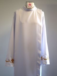 Clergy Vestment Custom made to fit. - there is embroidery designs on the front on the bottom front and back. And both sleeves. All embroidery are on white color to make them easy to wear all year long. But they can be changed if requested. Measurements are 100% custom to fit. We will be more than happy to work with you to ensure your needs are meet. Fitted White Tops With Machine Embroidery, Fitted White Top With Machine Embroidery, White Fitted Top With Machine Embroidery, Heart Sign, White Color, Custom Shirts, To Work, Embroidery Designs, Custom Made