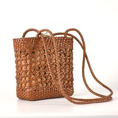 d1122b-1 Accessories Brown Casual Vintage Brown Rectangular Bag, Brown Rectangular Bucket Bag With Adjustable Strap, Retro Brown Bag For Daily Use, Retro Brown Square Shoulder Bag, Leather Bucket Bag With Braided Handles, Casual Woven Leather Pouch Shoulder Bag, Light Brown Woven Bags For Daily Use, Casual Leather Square Satchel, Daily Use Light Brown Woven Bag