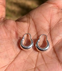 925 Sterling Silver Handmade Small Hoop Earrings, Huggies, Kundal, Tribal Earrings 2 pc/ 1 Pair, Minimalistic Jewelry, 14mm Length, 1.5 gm About this item Country of Origin- India * Pack in a Pouch. Pack of 2 Pc means 1 Pair * We sell 100% natural gemstones & Silver Jewelry only * * Silver Designer Decorative Hoop Earrings, Kaanan Kundal for Kanha ji and for self. * Can be be used for sringaar of Lord Krishna during Janmashthami and other religious occasions * Hollow, Junky, Earrings * Size 14mm Earrings Huggies, Minimalistic Jewelry, Kanha Ji, Hoops Silver, Small Hoop Earrings, Winter Gift, Summer Gift, Hoop Earrings Small, Light Weight Earrings