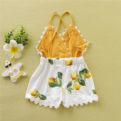 Summer FUN in this gorgeous lemon romper. Every beauty needs this. Cami Romper, Girl Sleeves, One Piece Clothing, Ruffle Jumpsuit, Lace Trim Cami, Trendy Summer Outfits, Lemon Print, Kids Outfits Girls