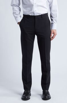 Smart and versatile, these dress pants tailored from polished wool feature a touch of stretch to keep you moving comfortably at any formal occasion. 36 1/2" inseam; 15" leg opening; 9 1/2" front rise; 15" back rise (size 30) Zip fly with hook-and-bar closure Front slant pockets 96% wool, 4% elastane Dry clean Imported Mens Black Dress Pants, Balck Dress, Black Suit Pants, Radium Girls, Black Dress Pants Men, Formal Pant, Pants Tailored, Girls Closet, Classic Black Dress