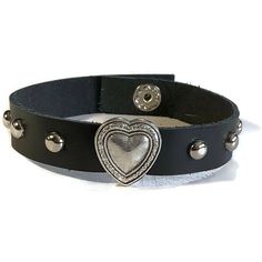 "Soft Studded Black Flower Leather Bracelet - Silver Round Studs - 10mm Black Leather Wristband This black leather wristband is 10mm wide and about 8 inches long. It can fit a wrist 7.5\" around. The strap is made of handcut soft cowhide Genuine leather. It have added a silver heart slide charm in the center with 5 mm Silver Round Studs evenly spaced on both sides. I have added a silver snap button closure on the ends. I have worn it myself and get many compliments on it. The silver flower seems Three Necklaces, Leather Heart, Leather Wristband, Background Simple, Leather Wristbands, Funky Jewelry, Black Flower, Dream Jewelry, Bracelet Silver