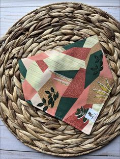 a close up of a basket with a cloth on it and a napkin in the middle