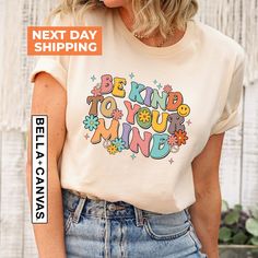 "Be Kind To Your Mind Shirt, Mental Health Gift, Inspirational Shirt, Mental Health Shirt, Therapist Shirt, Mental Health Awareness  Hi!  Welcome. It's great to see you here! ☺️ Our shirts are clean, high quality and soft. It is prepared quickly by our boutique.  Ironing and shipped.  Enjoy your shopping! It is a pleasure for us to help you with your questions and you can reach us at any time. Please, don't forget to check our size cards. HOW TO ORDER SHIRT 👕 Please, choose your favorite t-shirt color and size from the pop-up window. Select the quantity that you want. Click \"ADD TO CART\". You can go back to add more product color  for your loved ones members. You can complete the checkout process. Please \"Click Proceed to Check Out\" Finally, you have completed all the steps, your prod Casual Multicolor Slogan Shirt, Multicolor Cotton Slogan Shirt, Multicolor Cotton Shirt With Slogan, Mental Health Shirts, Be Kind To Your Mind, School Psychologist, Health Shirt, Inspirational Shirt, Be Kind To Yourself