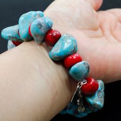 ✦Gemstone: Natural Kingman Turquoise, Coral ✦Color: Blue, Red ✦Shape: Nugget ✦Length: 6''-8'' ✦Bead Size: Big Rough Nugget:25x17x6mm Small Rough Nugget:17x12x7mm Red Coral:11x7mm ✦Weight: 355.5ct ✦QTY: 1 pcs / package ♕Beautiful & High Quality Findings♕ You will receive the same quality has you see in picture. CLICK BELOW TO CHECK ALL OUR BEAUTIFUL GEMSTONE BRIOLETTES. https://www.etsy.com/shop/TurquoiseFactory?ref=seller-platform-mcnav Color may vary slightly due to your monitors' color cal Southwestern Style Red Beaded Bracelets For Gift, Southwestern Style Red Beaded Bracelet As Gift, Red Gemstone Beaded Bracelet Bohemian Style, Red Bohemian Beaded Gemstone Bracelet, Nugget Bracelet, Healing Gemstone Bracelets, Reiki Jewelry, Amazonite Bracelet, Kingman Turquoise