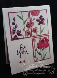 a close up of a greeting card with flowers on the front and back of it