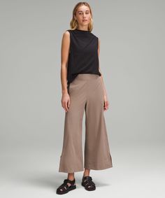 These High-Rise, Wide-Leg Crops Flow With Your Every Move For An Easy Approach To Your Daily Routine. Designed For Casual. Relaxed Fit Is Roomy Through Glutes And Thighs:sits Away From Body, Hip To Hem:intended To Sit Above Ankle. Hand Pockets With Hidden Card Sleeve. | Stretch Woven High-Rise Wide-Leg Cropped Pant Cropped Pants Women, Wide Leg Cropped Pants, Card Sleeve, Womens Capris, Material Girl, Pants Design, Material Girls, Athletic Pants, Daily Routine