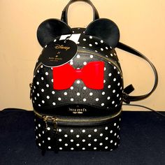 Nwt Kate Spade Disney Minnie Mouse Backpack. Black With White Polka Dots And A Big Red Bow With The Ears Minnie Mouse Backpack For Daily Use, Trendy Minnie Mouse Travel Backpack, Trendy Minnie Mouse Backpack For Travel, Trendy Mickey Mouse Backpack For Disney Trips, Black Backpack With Zipper For Disney Fan Events, Black Mickey Mouse Backpack For Disney Fan Events, Kate Spade Leather Backpack, Disney Backpack, Butterfly Backpack