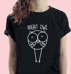 "Night Owl T-shirt Cool Casual Tumblr Vintage Tee AVAILABLE SIZES: S,M,L,XL,2XL,3XL COLOR: WHITE, BLACK, HEATHER GREY, SUNFLOWER CONDITION: BRAND NEW T-SHIRT SPECS : 100% high quality pre-shrunk cotton (165 g/m2) jersey). Taped neck and shoulders, twin needle stitching, seamless collar. PRINT: Highest quality print - not cheap \"iron-on\" transfers! MEASUREMENTS : width - armpit to armpit ; length - the body length is measured in a straight line from the highest point of the shoulder at the join Cute Black T-shirt With Graphic Design, Cute Black Graphic T-shirt, Tumblr Tee, Owl T Shirt, Night Owl, Straight Line, Friends Tv, Vintage Tee, New T