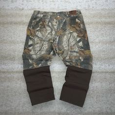 "Vintage Wrangler Real Tree Hunting Camo Jeans Chocolate Brown Double Knees Baggy Fit Crazy Woodland Pattern 90s Skate / Streetwear Great Condition: 7/10 (small marks like shown , aka some character) Men's Size:  Waist: 42\" Length (inseam): 30\" Leg Opening: 9\" Thigh Opening: 15\" Front Rise: 14\"" Rugged Relaxed Fit Bottoms For Fall, Western Style Cotton Bottoms For Fall, Woodland Pattern, 90s Skate, Hunting Camo, Skate Streetwear, Camo Jeans, Skater Streetwear, Real Tree