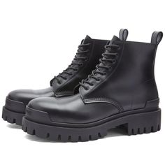 Feel powerful with every wear in this pair of Balenciaga boots. With a slick leather upper, they’re styled with a heel pull tab and laces for a secure fit, while a durable rubber sole adds a combat-ready touch..Leather Uppers.Heel Pull Tab.Rubber Outsole Streetwear Ankle-high Boots With Reinforced Heel, Ankle-high Boots With Reinforced Heel For Streetwear, Streetwear Lace-up Ankle Boots With Reinforced Heel, Streetwear Ankle Lace-up Boots With Reinforced Heel, Ankle-high Combat Boots With Reinforced Heel For Streetwear, Winter Streetwear Heeled Boots With Reinforced Heel, Edgy High Ankle Boots With Leather Sole, Fall Lace-up Boots With Vibram Sole, Fall Streetwear Lace-up Ankle Boots