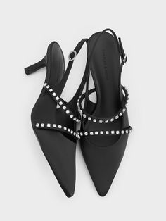 These black Mary Jane pumps exude a vintage vibe, thanks to their pretty satin finish and classically feminine design. Featuring two sparkling crystal-embellished straps across each vamp, they sit on mid-height stiletto heels that will give you a boost in both confidence and stature. The elasticised slingback straps ensure these shoes are easy to put on and take off -- they can also be adjusted for a comfortable and secure fit. Mary Jane Pumps, Charles Keith, Vintage Vibe, Feminine Design, Black Textures, Sparkling Crystal, Vintage Vibes, Satin Finish, Mary Janes