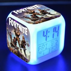 the fortnite alarm clock is lit up and ready to be used as an alarm clock