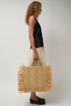 Holds-everything raffia tote with fringed edges. Unlined. Magnetic closure and thick straps. A perfectly festive summer satchel. Summer Satchel, Straight Fringe, Modern Weaving, Square Bag, Magnetic Closure, Satchel, Weaving, Festival, Square