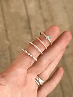 These rings are made of .925 sterling silver. I am new to silverwork, so please give me grace with sizing & my welding! Nonetheless, these rings are beautiful, simple, dainty stackers. They can be daily wearers, as they’re super comfortable! If you are purchasing 3 or more, check out my other listings for a set of 3, for a discount! These rings are handmade to order, so please allow 1-2 weeks before your order is shipped. Silver Wallet, Sterling Silver Stacking Rings, Silver Stacking Rings, Pet Id Tags, Stacking Rings, Turquoise Stone, Sterling Ring, Watch Bands, Sterling Silver Rings