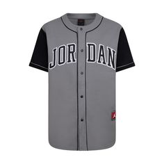 Baseball vibes with a basketball legacy. Showcase your love for both games in the Jordan HBR Baseball Jersey. Made with lightweight fabric, this jersey buttons down the front. It features heat-sealed Jordan and 23 logos on the front and back. Pair it with your AJ1s for a look worth posting on your socials. Button down jersey. Heat-sealed appliques logos at the front and back. Imported. Varsity Cotton Jersey With Team Name, Collegiate Cotton Basketball Jersey, Collegiate Jersey With Baseball Collar In Cotton, Collegiate Cotton Jersey With Baseball Collar, Collegiate Cotton Jersey For Baseball Season, College Baseball Jersey In Team Colors, College Team-colored Cotton Baseball Jersey, Cotton Jersey With Letter Print For Game Day, Cotton Letter Print Jersey For Game Day