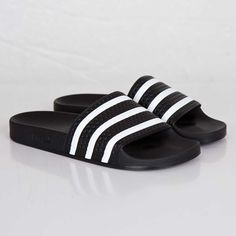 adidas Adilette Sporty Adidas Slides For Beach, Non-slip Sandals For Summer Streetwear, Adidas Logo Synthetic Slides For Streetwear, Sporty Adidas Logo Open Toe Slides, Sporty Adidas Logo Slides With Open Toe, Comfortable Summer Sandals For Streetwear, Adidas Logo Slides For Sports In Spring, Adidas Logo Slides For Beach, Adidas Slides For Sports In Spring