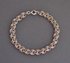 Art deco era 835 silver Garibaldi chain bracelet. Length 18 cm (7.1"), Width 0.7 cm (0.3") Weight 9.7 grams Hallmarked: 835 for European silver Very good vintage condition Will be delivered by tracked mail. Thank you for looking. Please see my other items. Hallmarked Link Sterling Silver Bracelet, Handmade White Gold Metal Chain Bracelet, Handmade White Gold Chain Bracelet, Silver Vintage Chain Link Bracelets, Vintage Silver Chain Link Bracelets, Hallmarked Sterling Silver Link Bracelet, Silver Chain Link Bracelet For Formal Occasions, Formal Silver Chain Link Bracelet, Classic Metal Chain Bracelet