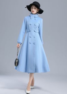 "How elegant the coat is! The blue wool coat was designed with a A-line silhouette and a fitted waist. It is made from blue wool blend fabric ,This warm winter coat is crafted with a high collar so it can keep you warm in cold weather. The midi coat open by front buttons. the belt loops can adjust the waist size. two side pockets and double breasted on it , it is handmade by Xiaolizi, more color available if you need, just write to us. DETAIL * More color optional https://etsy.me/3AwTfvZ * 50% w Solid Wool Coat With Buttons For Spring, Buttoned Wool Coat For Spring, Spring Long Sleeve Solid Color Wool Coat, Spring Solid Color Long Sleeve Wool Coat, Spring Solid Color Wool Coat, Elegant Solid Spring Wool Coat, Elegant Spring Wool Coat In Solid Color, Winter Wool Coat For Office, Double-breasted Wool Coat With Buttons For Spring