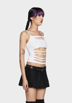 cuz you were born to be wild! This cropped tank top has a stretchy jersey construction, slashed cutouts at front, a square neckline, and adjustable shoulder straps. White Club Top With Built-in Bra, Y2k White Crop Top For Night Out, Punk Style Tank Top For Club In Spring, Punk Style Tank Top For Club And Spring, Punk Style Tank Top For Spring Club Events, Punk Style Tank Top For Spring Club Season, Y2k Tank Crop Top For Club, Y2k Cami Crop Top With Straps, Trendy Club Tops With Tank Straps