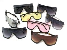 These shield style sunglasses offer 100% UV protection, half plastic frames  and multi color shield one piece lenses. Have molded nose pads. Great for any kind of outdoor activities  and for safety purposes. Free shipping in the United States. Trendy Plastic Shield Sunglasses For Outdoor, Rimless Plastic Shield Sunglasses With Gradient Lenses, Rimless Polycarbonate Shield Sunglasses With Uv Protection, Rimless Shield Sunglasses With Tinted Lenses, Rimless Tinted Shield Sunglasses, Rimless Plastic Shield Sunglasses With Tinted Lenses, Trendy Polycarbonate Shield Sunglasses With Uva Protection, Trendy Multicolor Anti-reflective Shield Sunglasses, Casual Rimless Shield Sunglasses With Uva Protection