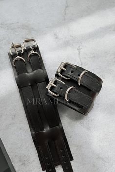 Black unisex leather bracelets with two stitched straps. Very stylish and universal to match with any outfit. The girth is adjustable for a perfect fit. Price includes 2 bracelets with premium package. Leather Handcuffs, Thigh Harness, Hand Cuff Bracelet, Black Goth, Neck Choker, Leather Corset, Leather Bracelets, Bracelets For Women, Bracelets For Men