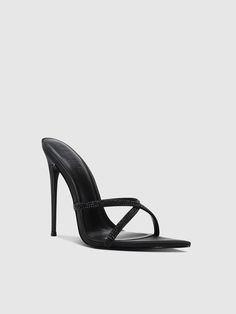 The Donatella Mule features a sleek criss-cross design with minimal straps and a slip-on detail. Its signature spiked stiletto heel adds a touch of edginess and makes it a versatile choice for both day and night wear. Satin upper Vegan insole Vegan outsole Open pointed toe Slip-on Handmade Designed in LA Self-covered stiletto heel, 4.75" (120mm) Pointed Heels, Night Wear, Cross Design, Cross Designs, Caicos Islands, Day And Night, Boot Sandals, Turks And Caicos Islands, Lace Boots