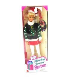 a barbie doll in a christmas sweater and skirt