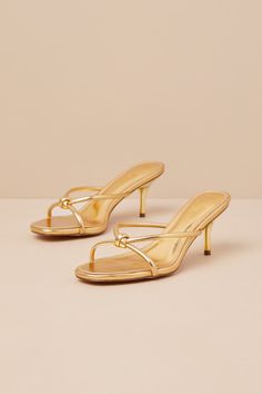 The Lulus Victoire Gold Knotted Strappy High Heel Slide Sandals are here to complete all your simply stunning date night looks! These strut-worthy sandals have a shiny faux leather construction that shapes an open-toe upper and an almond-shaped footbed. Crisscrossing straps boast a knotted detail atop the slide-on silhouette that sits atop a flirty stiletto heel. 2. 75" wrapped stiletto heel. Cushioned insole. Rubber sole has nonskid markings. Man made materials. Imported. Lulus | Victoire Gold Gold-studded Heels For Spring Party, Vacation Heels, Summer Party Heels With Gold-tone Hardware, Gold Sandals Outfit, Gold Heels Outfit, Gold Elegant T-strap Sandals With Heel Strap, Elegant Gold T-strap Open Toe Sandals, Formal Sandals With Gold-tone Hardware And Open Heel, Hoco Heels