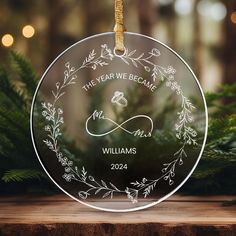 a glass ornament that says the year we came